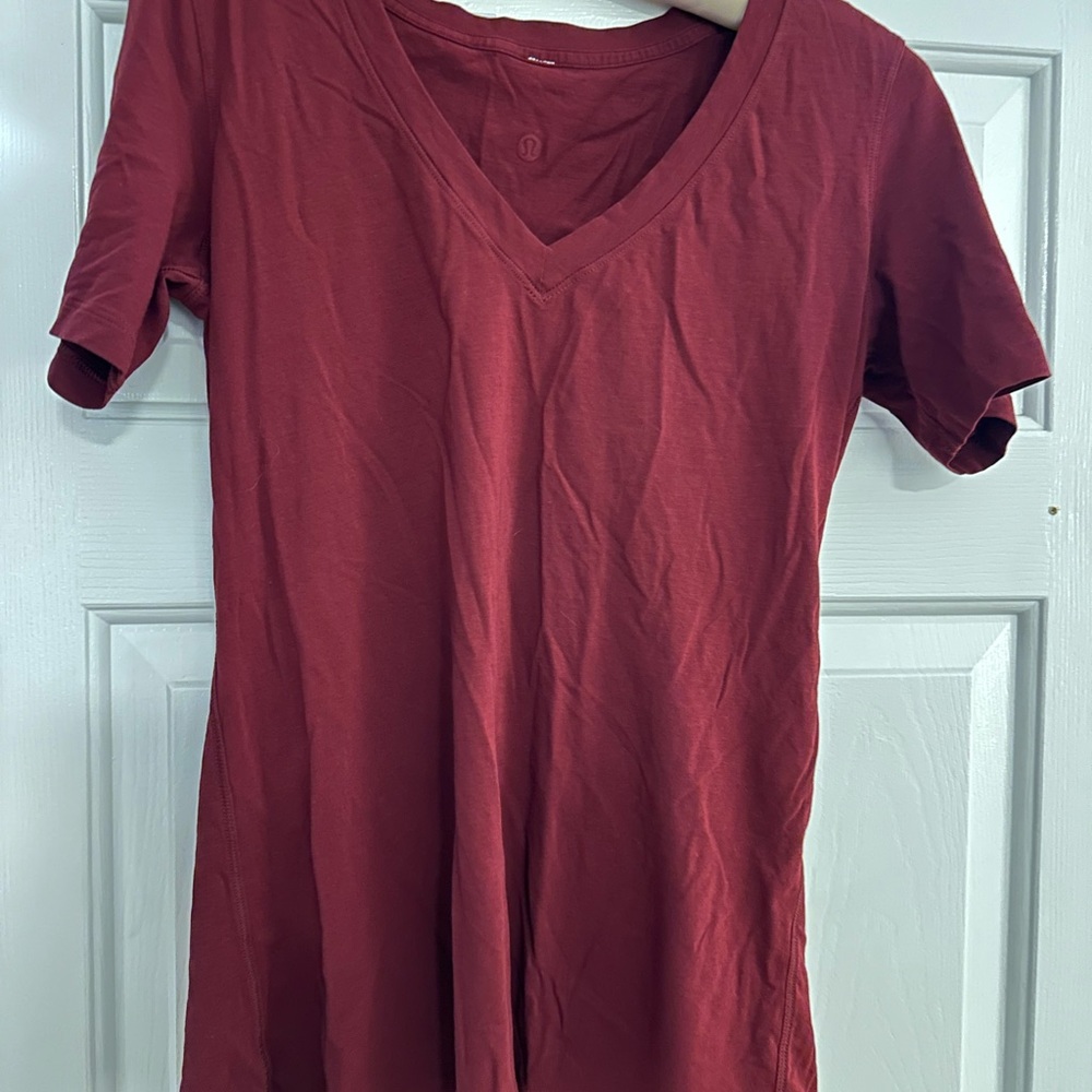 Lululemon burgundy V neck t-shirt. New without tags.